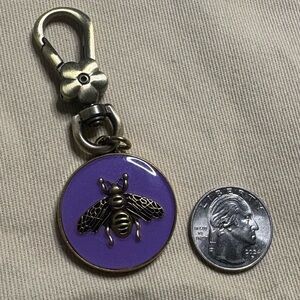 Gucci Gold Keychain with Black Accents